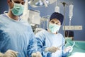 Surgeons working together while operation Royalty Free Stock Photo