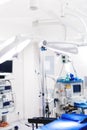 Surgery medical room, interior of operating room with surgical lamps. Details of moder hospital Royalty Free Stock Photo