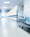 Surgical bed in hospital's corridor near operation room. Royalty Free Stock Photo