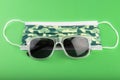 Surgical camo facemask and sunglasses