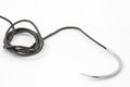 Surgical curved needle with thread, medical suture material, close-up, on white background Royalty Free Stock Photo