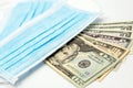 Surgical face masks and USA Dollar Banknotes, inflated export and import, mandatory masking