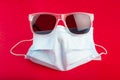 Surgical facmask and sunglasses for protection to covid 19 coronavirus Royalty Free Stock Photo