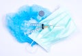 Surgical glove, mask, cap and syringe. Royalty Free Stock Photo