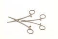 Surgical instrument (hemostat or artery clamp ) on white background