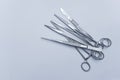 Surgical instruments on a blue gray background Royalty Free Stock Photo