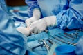 Surgical instruments and instruments, including scalpels, forceps and forceps, located on the table for surgery Royalty Free Stock Photo