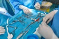 Surgical instruments and instruments, including scalpels, forceps and forceps, located on the table for surgery Royalty Free Stock Photo