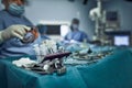 Surgical instruments in the operating room, the surgeon`s assistant arranges them on a sterile takani. The concept of Royalty Free Stock Photo