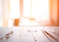 Surgical instruments on the table in the operating room of the hospital. Sunny sunset in the window. Surgery concept, amputation, Royalty Free Stock Photo