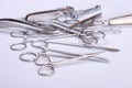 surgical instruments and tools including scalpels, forceps tweezers arranged on a table for surgery Royalty Free Stock Photo