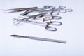 Surgical instruments and tools including scalpels, forceps tweezers arranged on a table for surgery Royalty Free Stock Photo