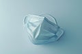 Surgical Mask on Blue Surface Royalty Free Stock Photo