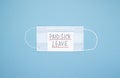 Surgical masks rubber ear straps with the words paid sick leave on a blue background Royalty Free Stock Photo
