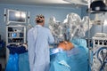 Surgical system with minimally invasive robot in a hospital. Robotic technological equipment, manipulator surgeon in a Royalty Free Stock Photo