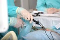 Surgical team. Laparoscopic instruments in hands of surgeon. Modern abdominal surgery. Laparoscopy in surgery. Surgical Royalty Free Stock Photo