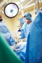 Surgical Team Working In Operating Theatre Royalty Free Stock Photo