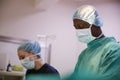 Surgical Team Working On Patient In Hospital Operating Theatre Royalty Free Stock Photo