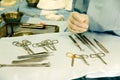 Surgical tools and nurse's hand Royalty Free Stock Photo