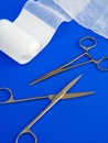 Surgical tools over blue background