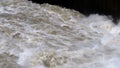 Surging water after being released through flood gate