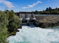 Surging wild white-water flowing through open dam gates at Aratiatia Taupo