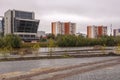 Surgut, Russia, 12 Griboyedov Street, May 11, 2022. Modern buildings and view of the embankment of the Ob river