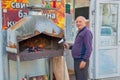 SURGUT, RUSSIA - SEPTEMBER 7, 2018: man with a hairdryer blows fire in the grill