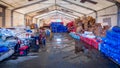 Surigao City Philippines. Super Typhoon Odette, Rai. Police guard and distribute international aid supplies.