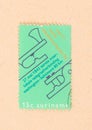 A stamp printed in Suriname shows world communication day, circa 1980