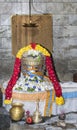 The Suriya Shiva Lingam in its shrine. Royalty Free Stock Photo