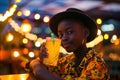 Surprise African Boy Sipping A Cocktail On City Background