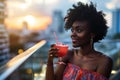 Surprise African Yearold Woman Sipping A Cosmopolitan On City Background Royalty Free Stock Photo