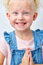 Surprise, excitement and fascination concept. Excited big blue eyed girl smiling, shocked Royalty Free Stock Photo