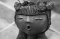 Surprise face of clay girl doll black and white filter effect