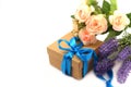 Surprise gift box with blue summer with a bouquet of roses