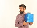 Surprise and holiday gift concept. Guy in plaid shirt Royalty Free Stock Photo