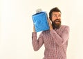 Surprise and holiday gift concept. Macho with wrapped blue gift Royalty Free Stock Photo