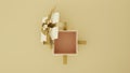 surprise open gift box with luxury creamy color with a golden ribbon top view