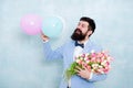 Surprise party romantic proposal ideas. Present for spouse. Bearded man with tulips. Guy with air balloons. Birthday