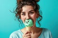 Surprise Yearold Woman Eats Mint Chocolate Chip Ice Cream On Turquoise Background