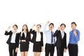 Surprised and amazed business people looking and pointing up Royalty Free Stock Photo