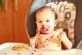 Baby led weaning - Surprised baby eating blueberries