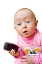 Surprised baby with cell phone, isolated Royalty Free Stock Photo