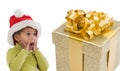 Surprised baby girl with one gift of Christmas Royalty Free Stock Photo