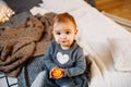 Surprised baby girl 1 year old. child`s eyes widened and mouth opened in amazement. Cute toddler girl. Top view Royalty Free Stock Photo