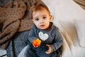 Surprised baby girl 1 year old. child`s eyes widened and mouth opened in amazement. Cute toddler girl. Top view Royalty Free Stock Photo