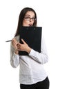 Surprised beautiful woman with a clipboard in his hands. Long-haired brunette in glasses and a white shirt. Shock, surprise. human Royalty Free Stock Photo