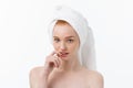 Surprised Beautiful Young Woman After Bath with A Towel On Her Head Isolated On white Background. Skin Care And Spa Royalty Free Stock Photo