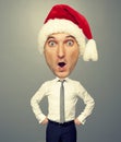 Surprised bighead man in santa hat